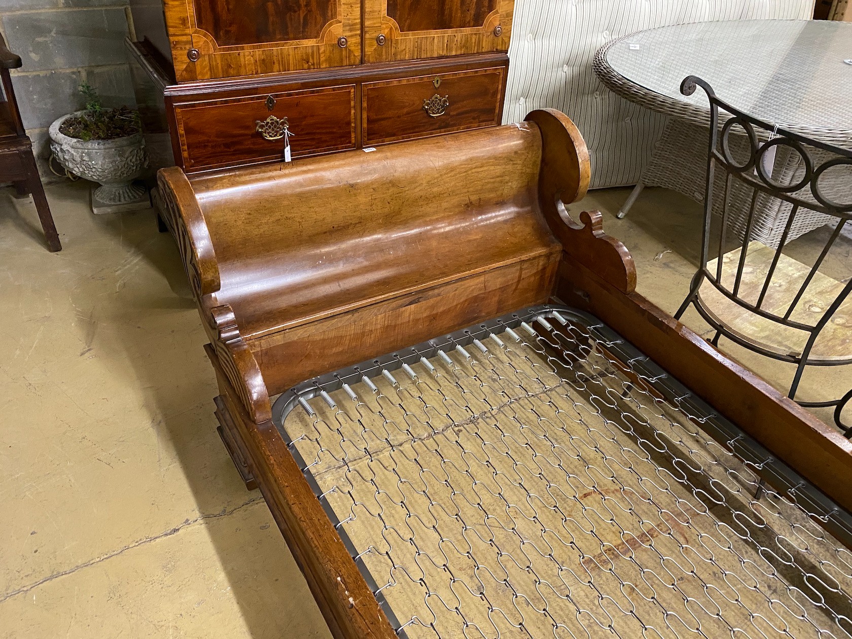 A 19th century Continental carved mahogany single sleigh bed, width 109cm, length 260cm, height 94cm